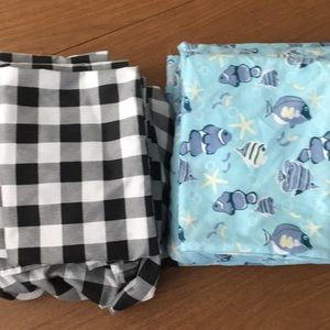 Two sets of Queen bed sheets. Black/white and fish